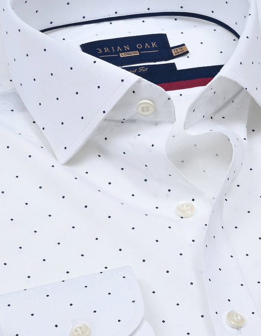 Chemise blanche à pois bleu marine