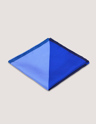 Pochette de costume en soie bleu uni de créateur