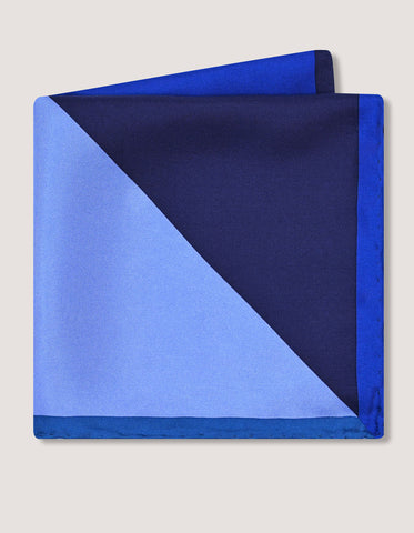 Pochette de costume en soie bleu uni de créateur