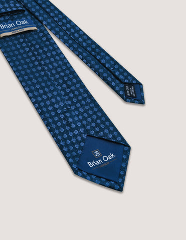 Cravate en soie à motif floral bleu marine et bleu